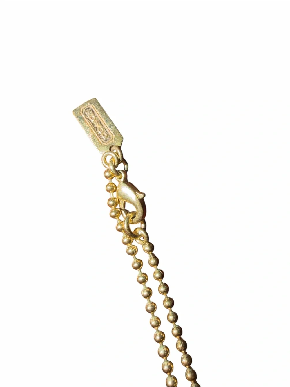Coach Gold-Tone Knot & Bead Long Necklace - Women Jewelry